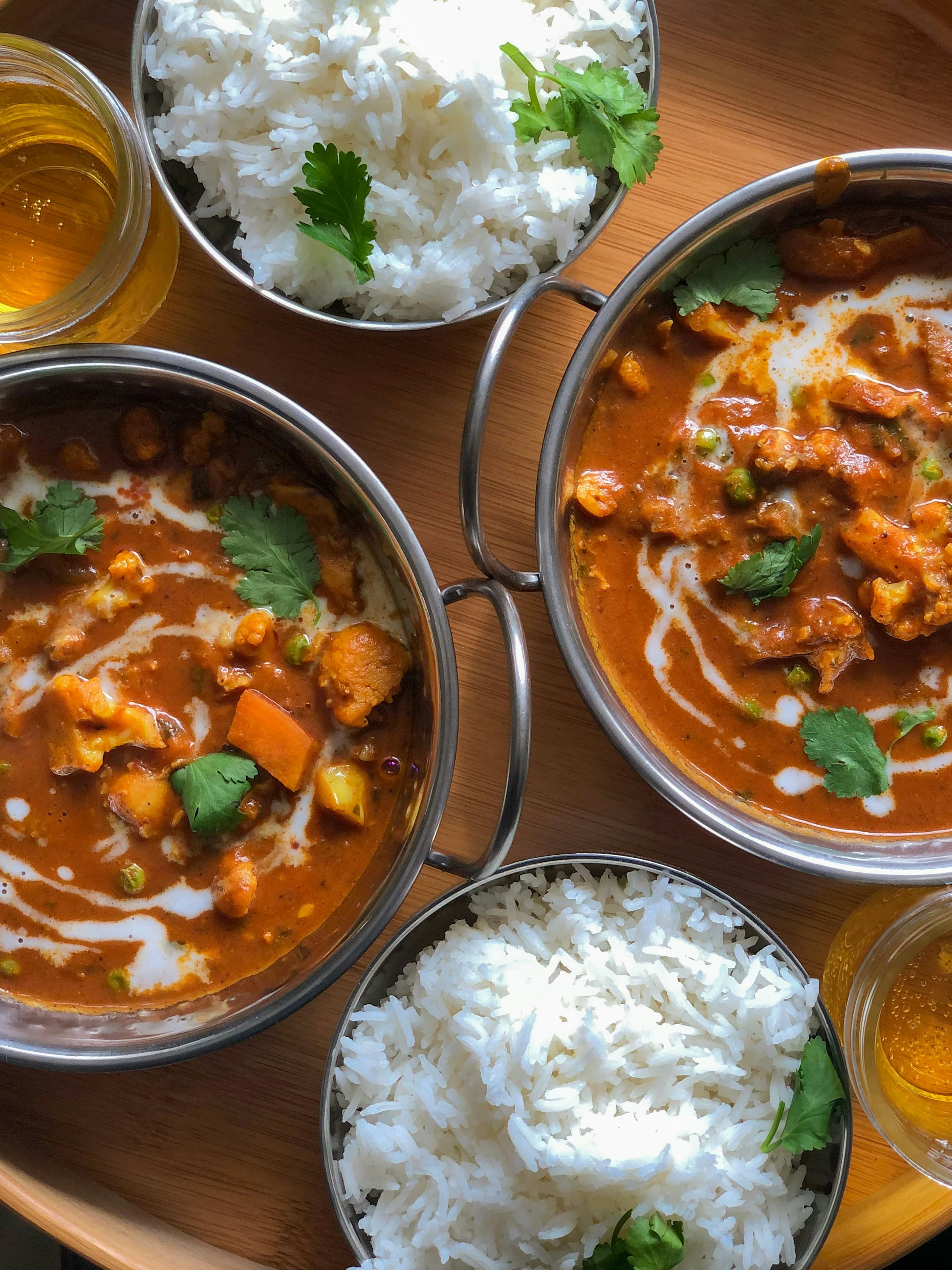 Richly spiced curry with basmati rice and naan — Bengali cuisine